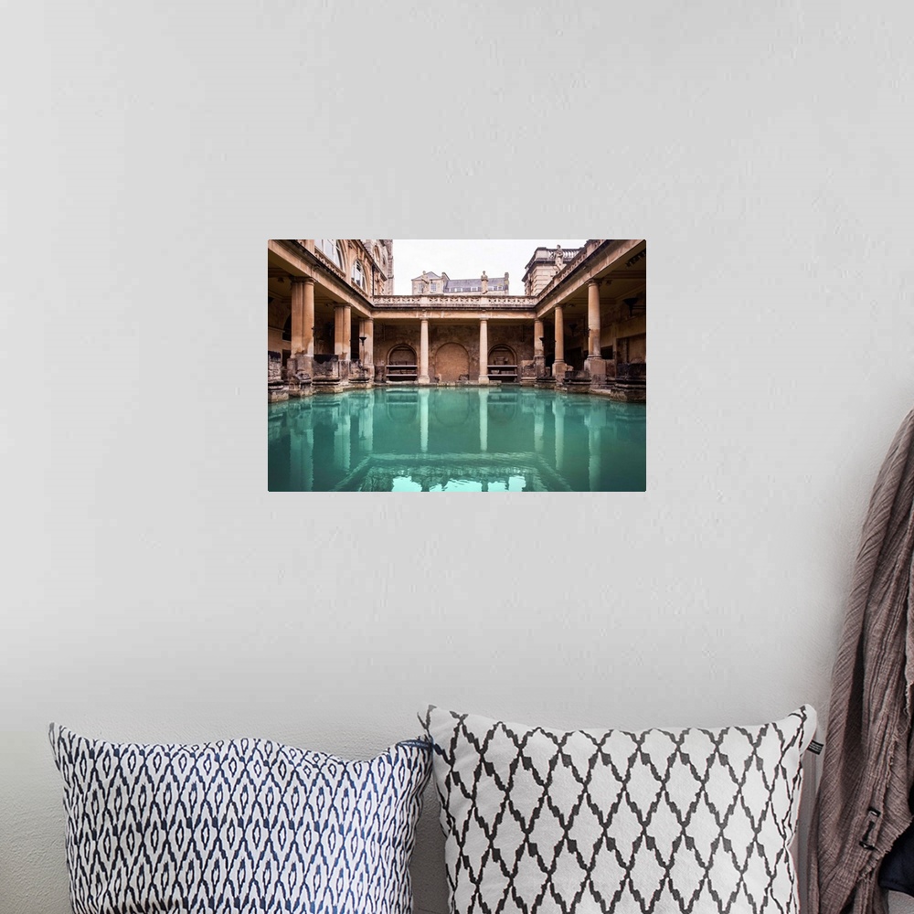 A bohemian room featuring Photograph of the ancient Roman Bath, called the Great Bath, in Bath, England, UK.
