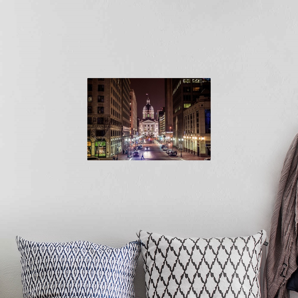 A bohemian room featuring Photo of the Indiana State House at night.