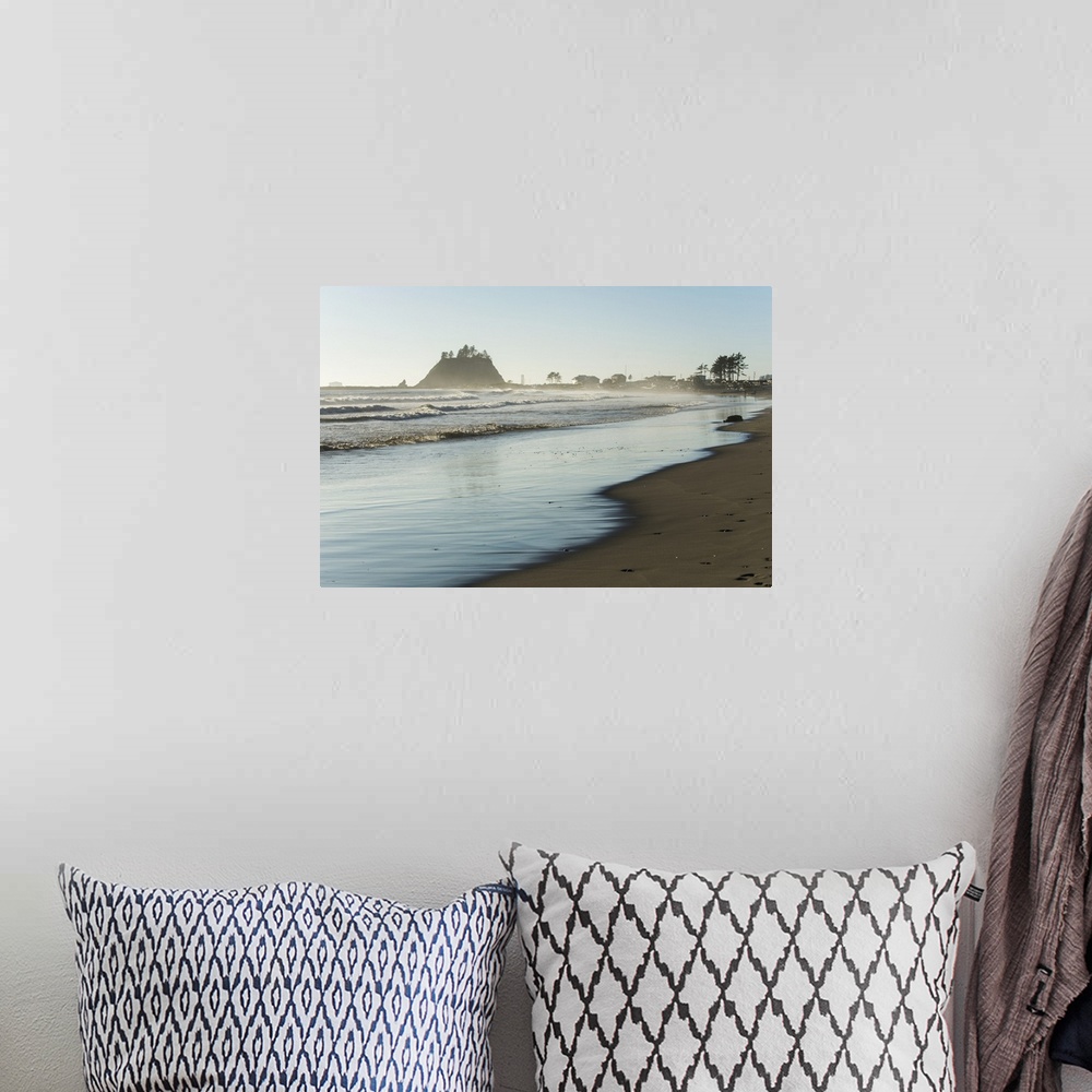 A bohemian room featuring Landscape photograph of the La Push Beach shore with misty rock cliffs in the background.