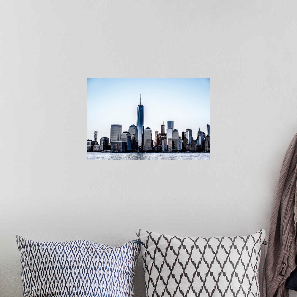 A bohemian room featuring View of the New York City skyline from across the Hudson River.