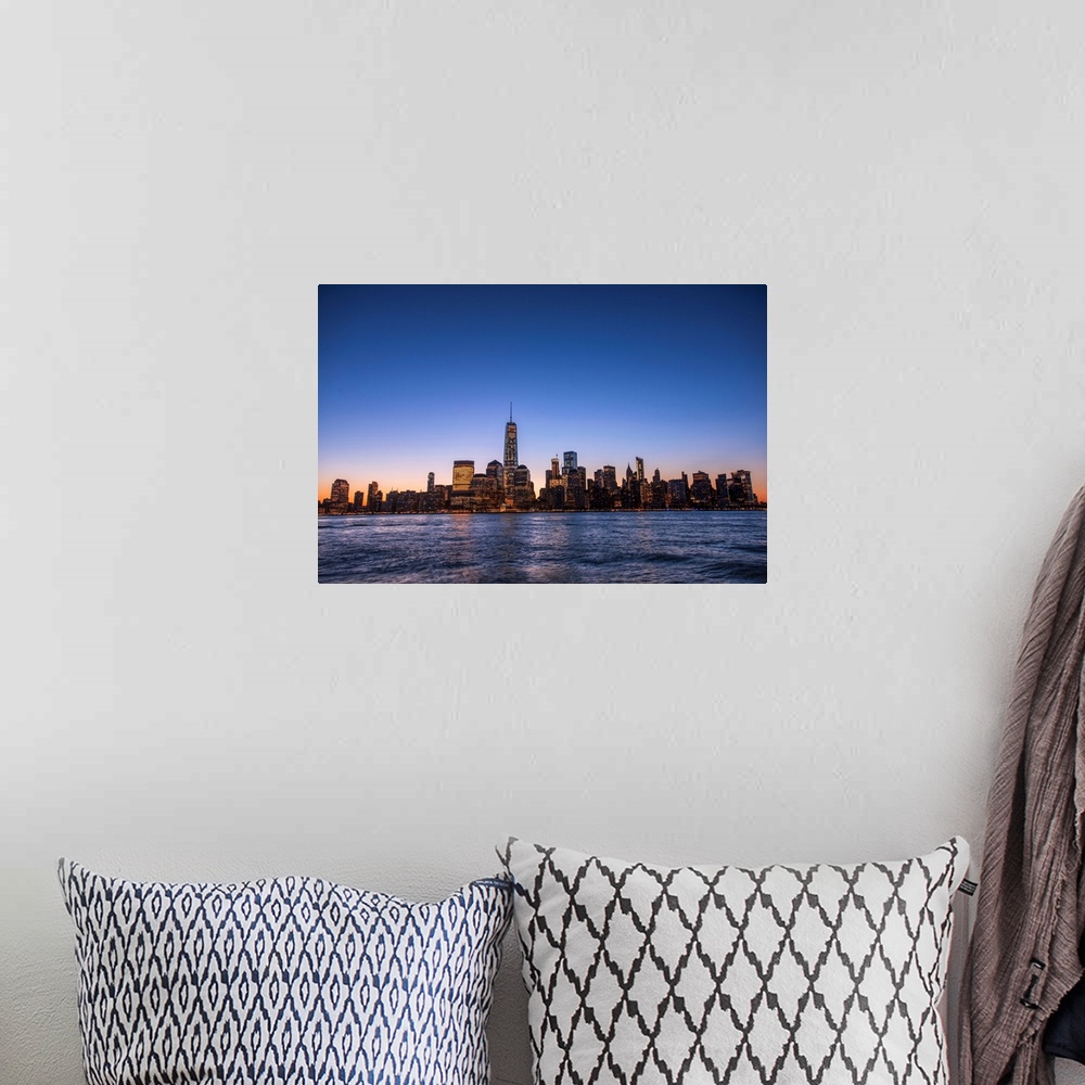 A bohemian room featuring The New York City Skyline, New York, seen in the morning.