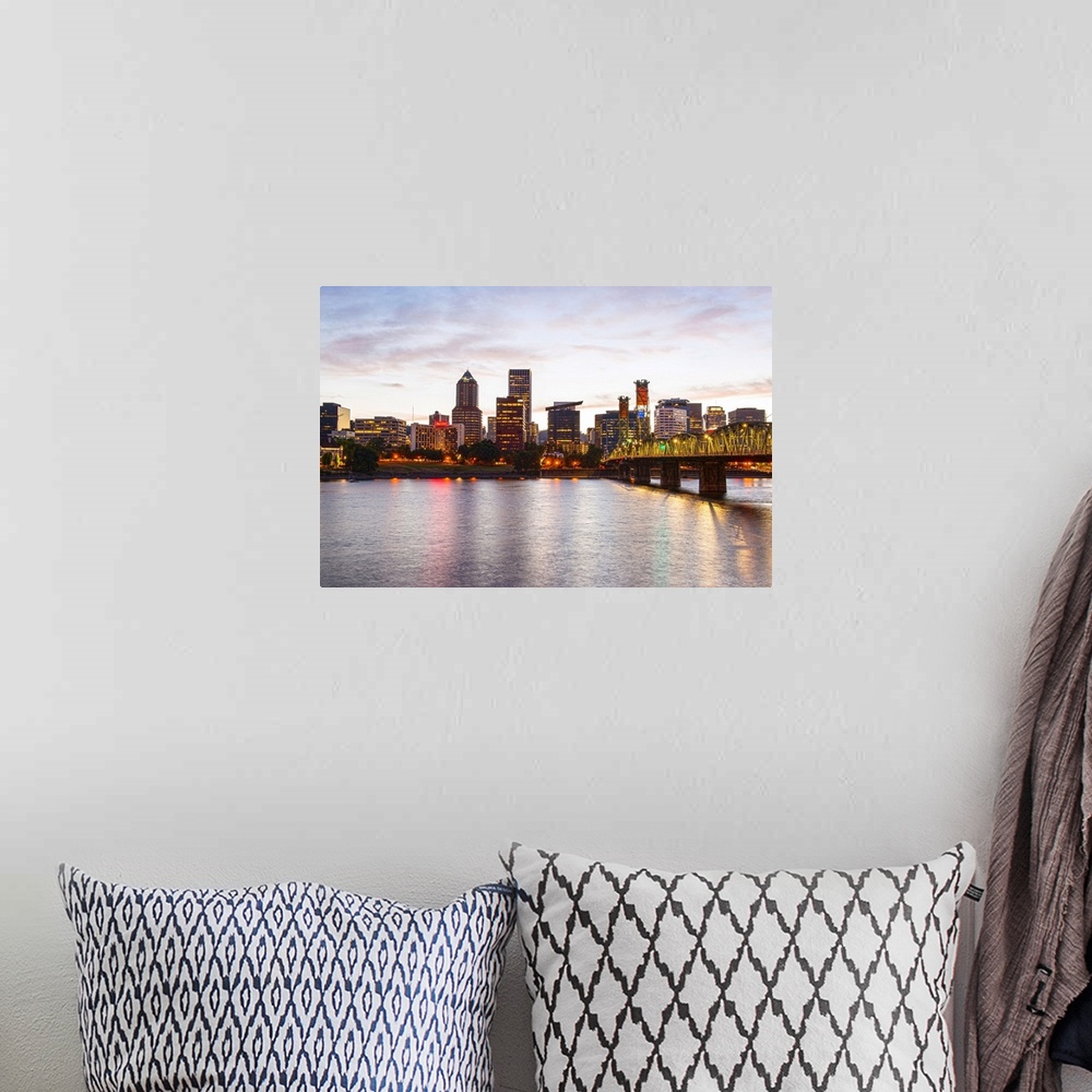 A bohemian room featuring Photograph of the Portland, Oregon skyline lit up at sunset with yellow lights and a small cresce...