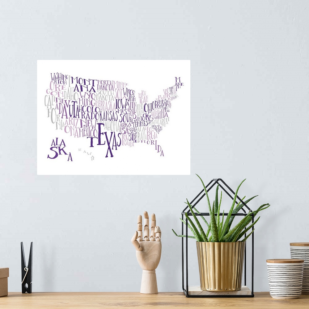 A bohemian room featuring A hand-drawn typography map of the United States with all the state names, in purple and grey.