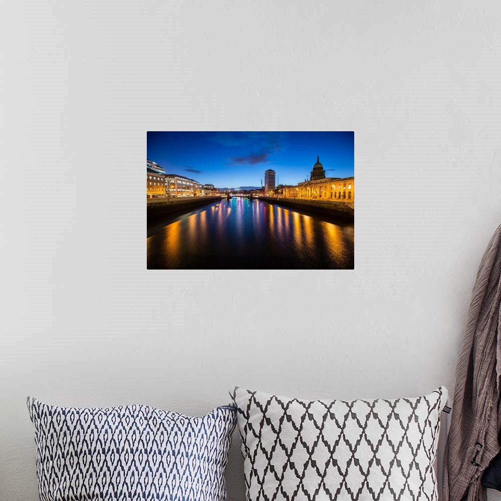 A bohemian room featuring Photograph going straight down the River Liffey with buildings, highlighting The Custom House, on...