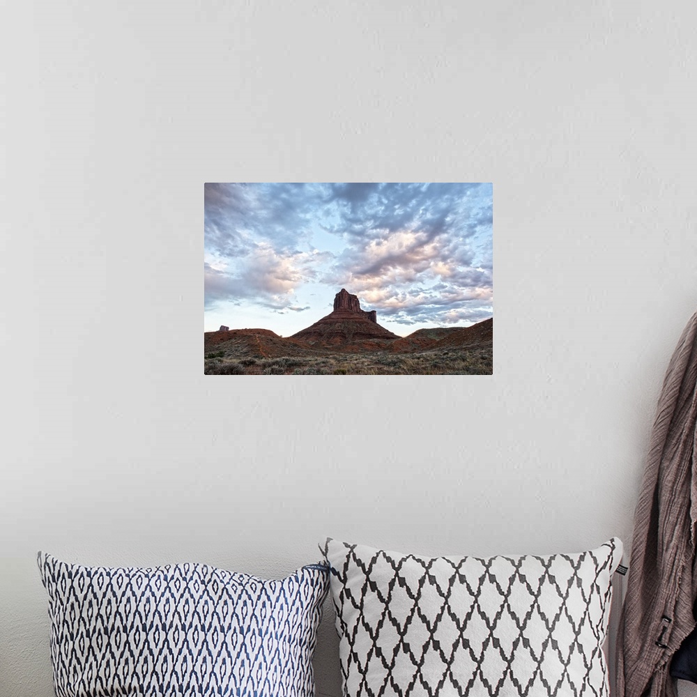 A bohemian room featuring Red sandstone tower rising over the desert landscape in Arches National Park, Utah.