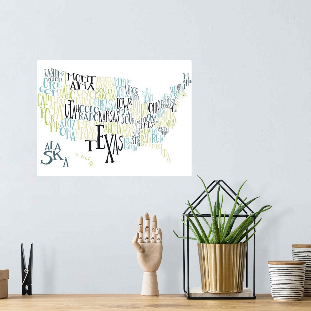 A bohemian room featuring A hand-drawn typography map of the United States with all the state names, in yellow, green, and ...