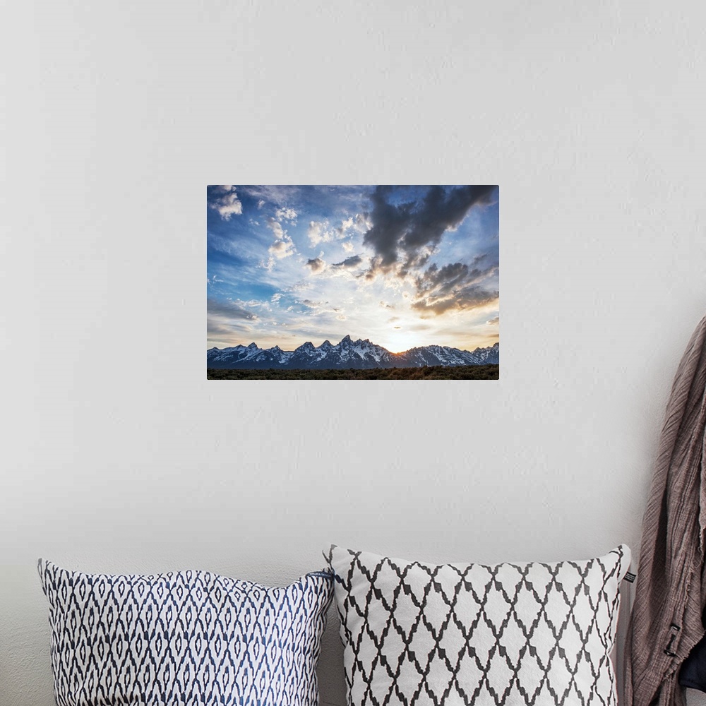 A bohemian room featuring View of clouds over Teton mountains in the morning in Wyoming.
