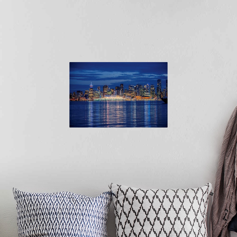 A bohemian room featuring View of Vancouver skyline at night in British Columbia, Canada.
