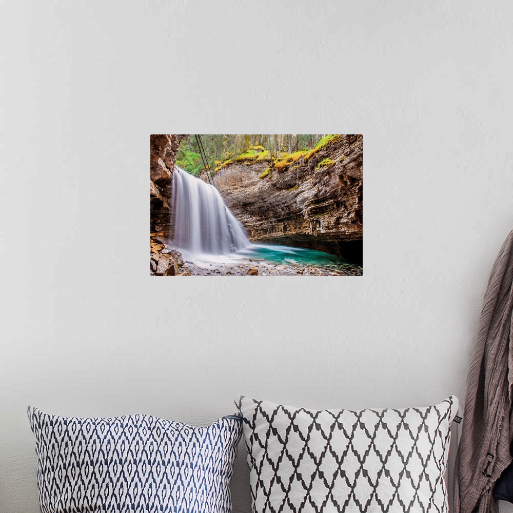 A bohemian room featuring Waterfall at Johnston Canyon in Banff National Park, Alberta, Canada.