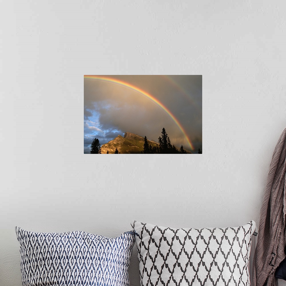 A bohemian room featuring Rainbow over Mt. Rundle after an early evening thunderstorm.
