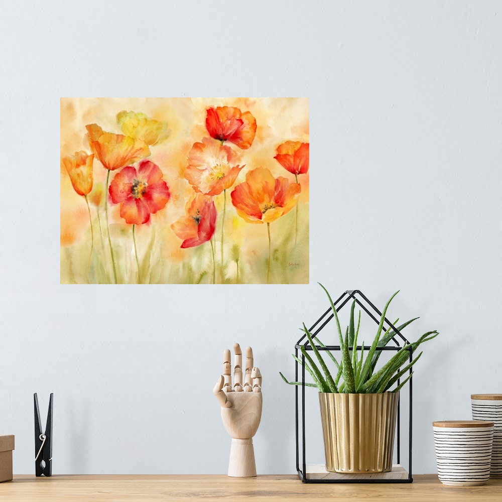 A bohemian room featuring A bright watercolor painting of red, orange and yellow poppies against a faded orange and green b...