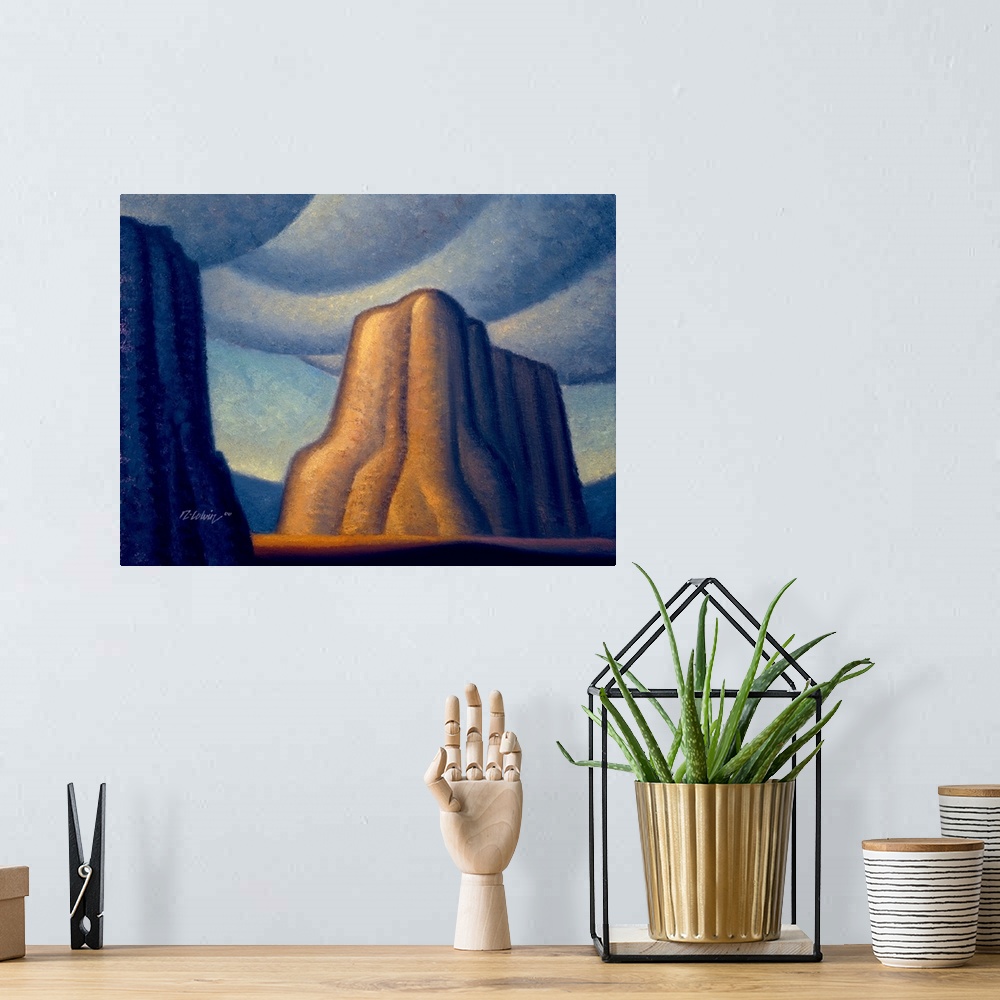A bohemian room featuring Contemporary painting of a desert butte.