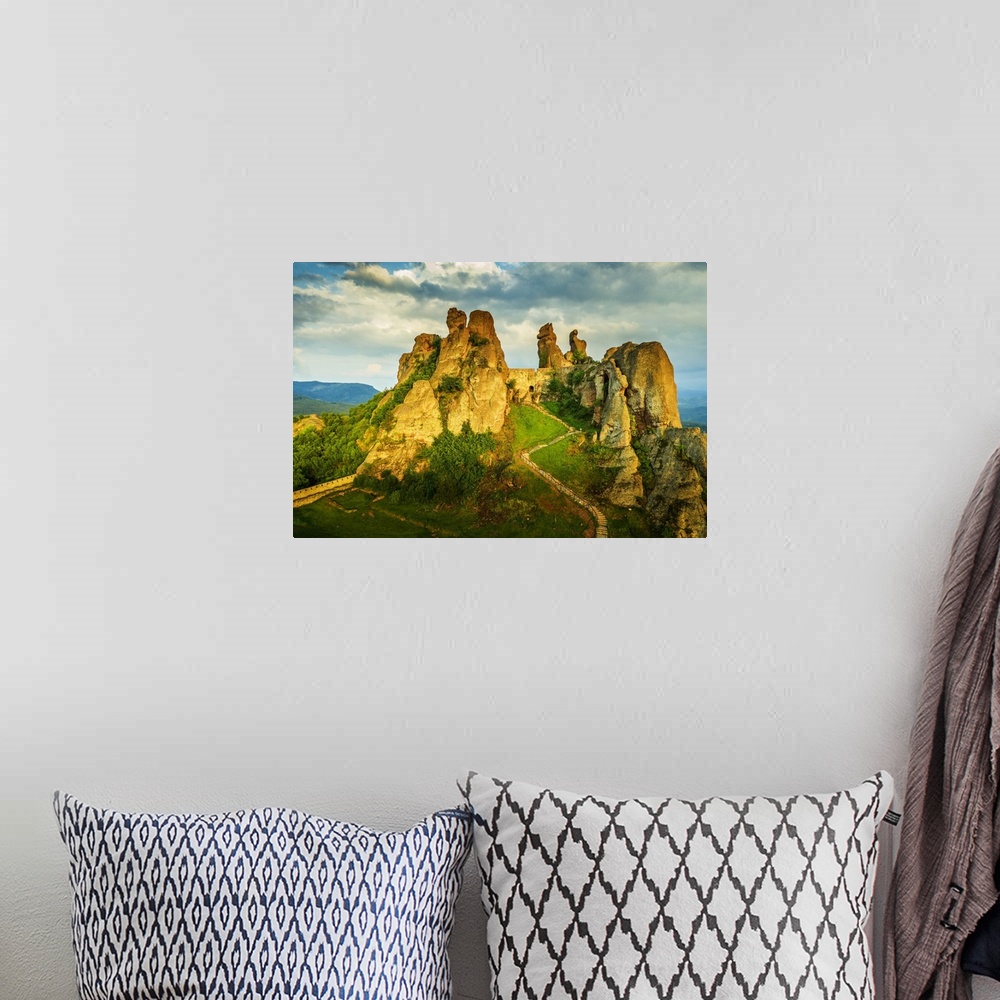A bohemian room featuring Aerial view by drone of Kaleto Rock Fortress rock formations, Belogradchik, Bulgaria, Europe