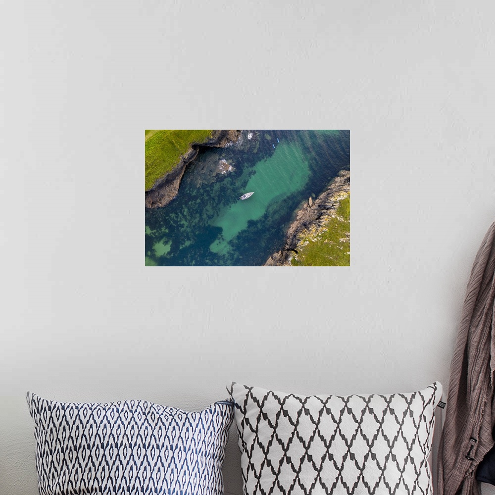 A bohemian room featuring Aerial view of a yacht moored in Port Quin, Cornwall, England, United Kingdom, Europe