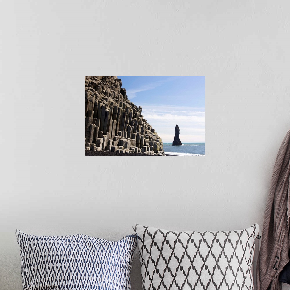 A bohemian room featuring Basalt cliffs and rock stack, Halsenifs Hellir Beach, South Iceland, Iceland