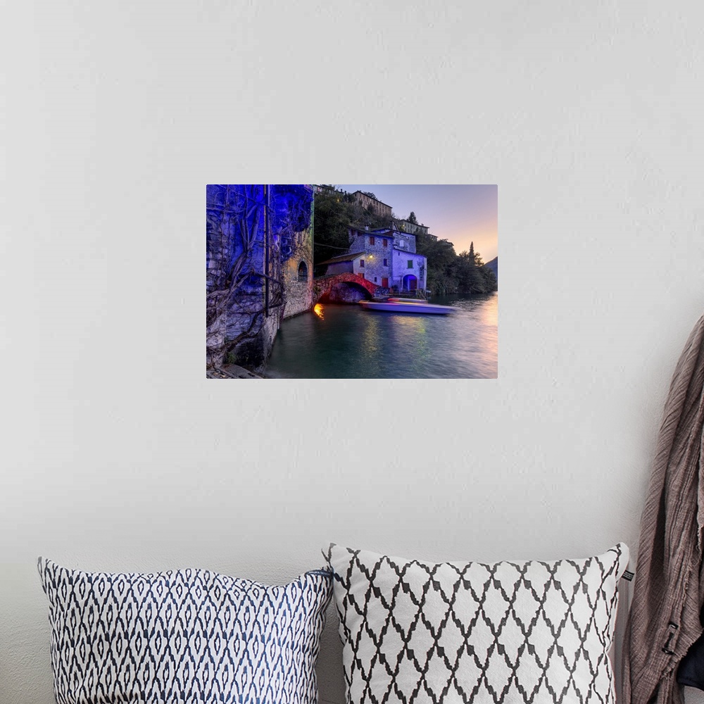 A bohemian room featuring Boat in motion under the illuminated Nesso bridge, Lake Como, Lombardy, Italian Lakes, Italy, Europe