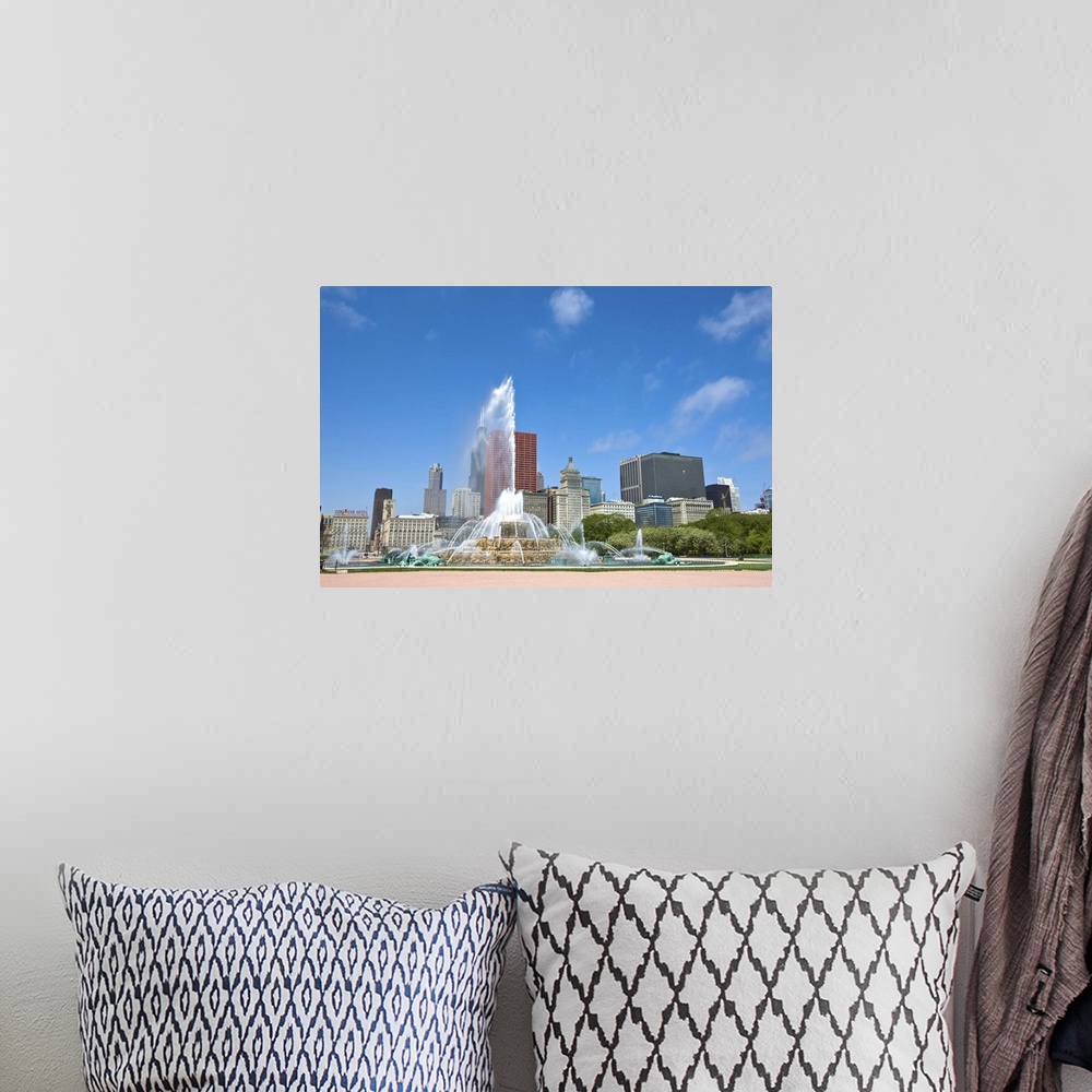 A bohemian room featuring Buckingham Fountain in Grant Park with skyline beyond, Chicago, Illinois, USA
