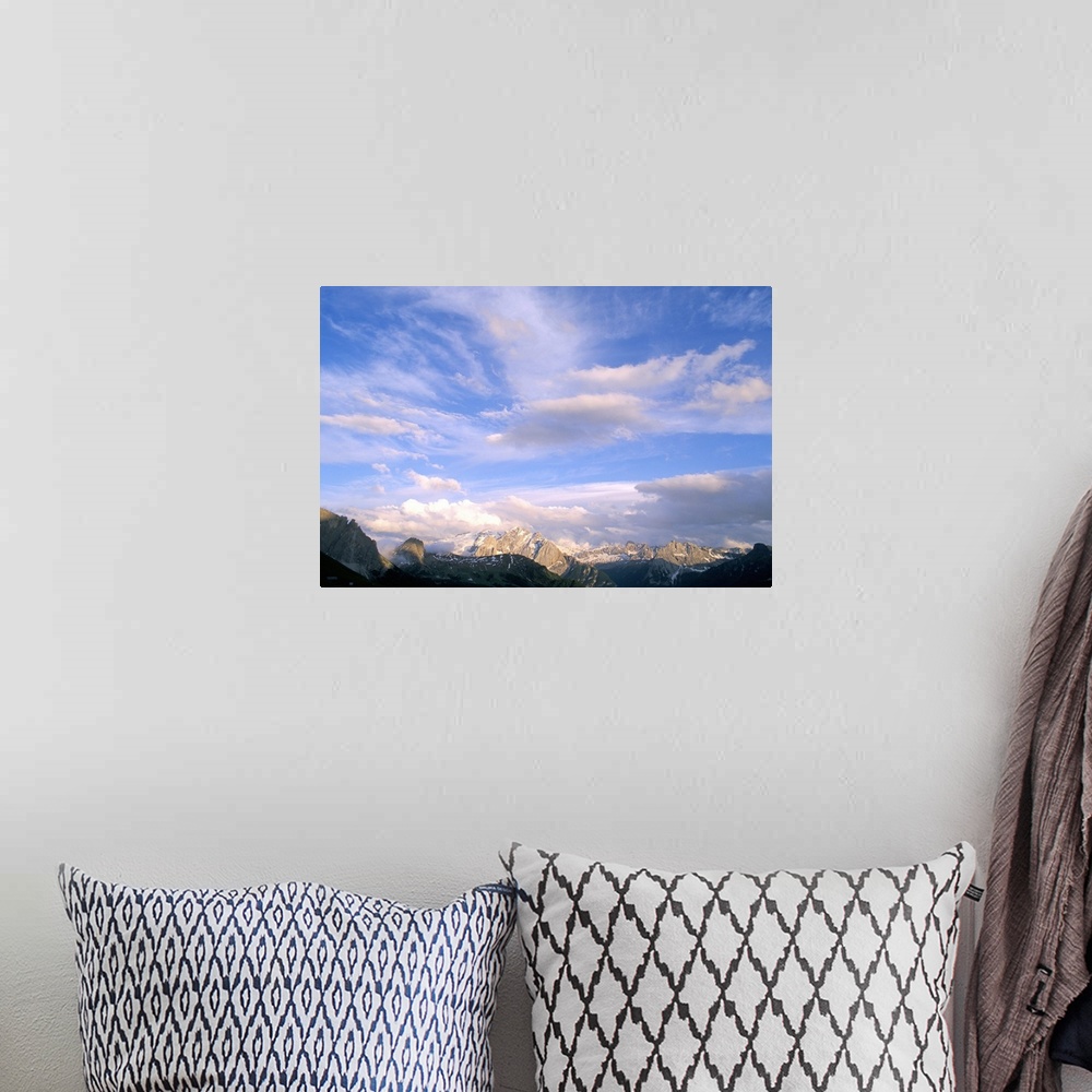 A bohemian room featuring Clouds above Marmolada range, 3342m, Dolomites, Alto Adige, Italy, Europe