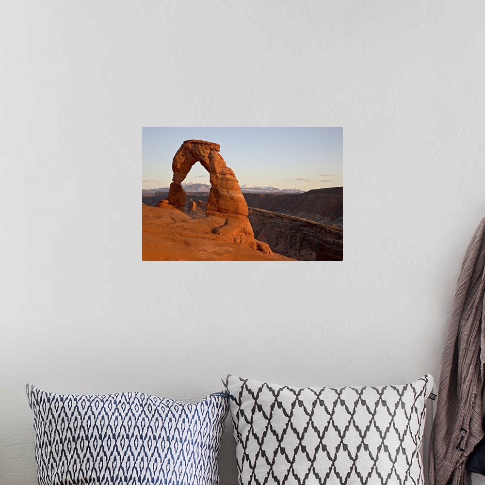 A bohemian room featuring Delicate Arch at sunset, Arches National Park, Utah