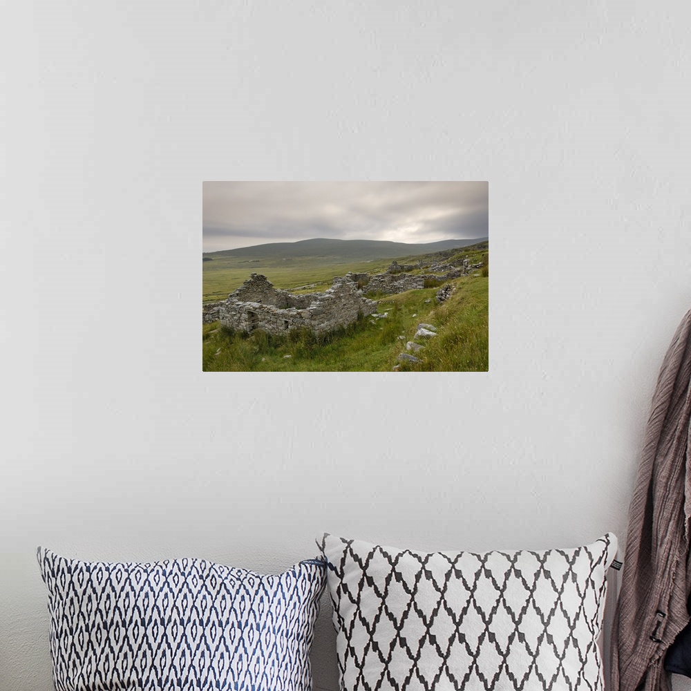 A bohemian room featuring Deserted village at the base of Slievemore mountain, Connacht, Republic of Ireland