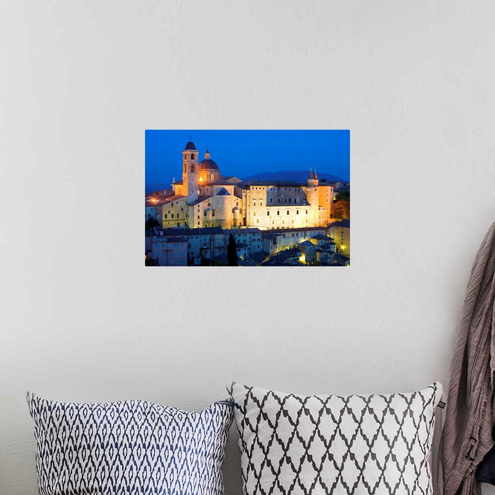A bohemian room featuring Ducal Palace at night, Urbino, Le Marche, Italy, Europe