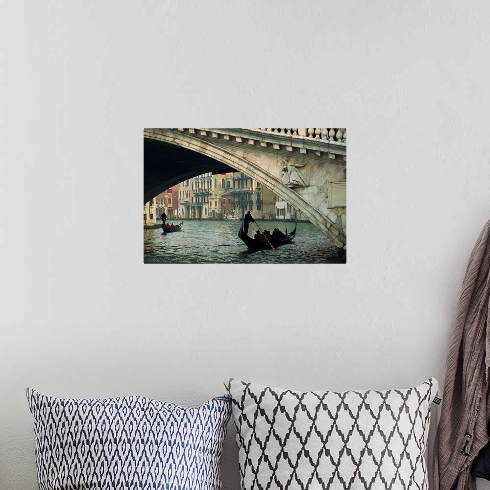 A bohemian room featuring Gondola under the Rialto Bridge on the Grand Canal in Venice, Italy