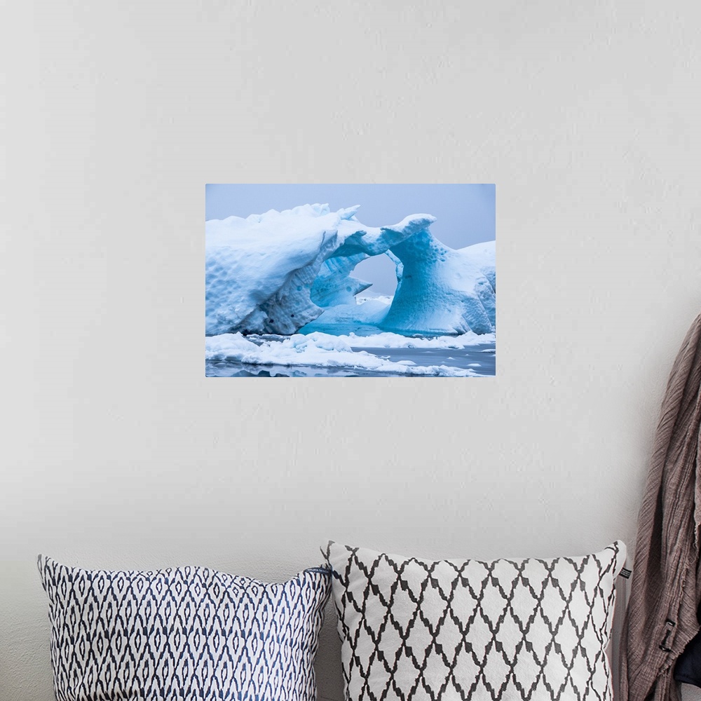 A bohemian room featuring Iceberg in the Antarctic waters, Enterprise Island, Antarctica, Polar Regions.