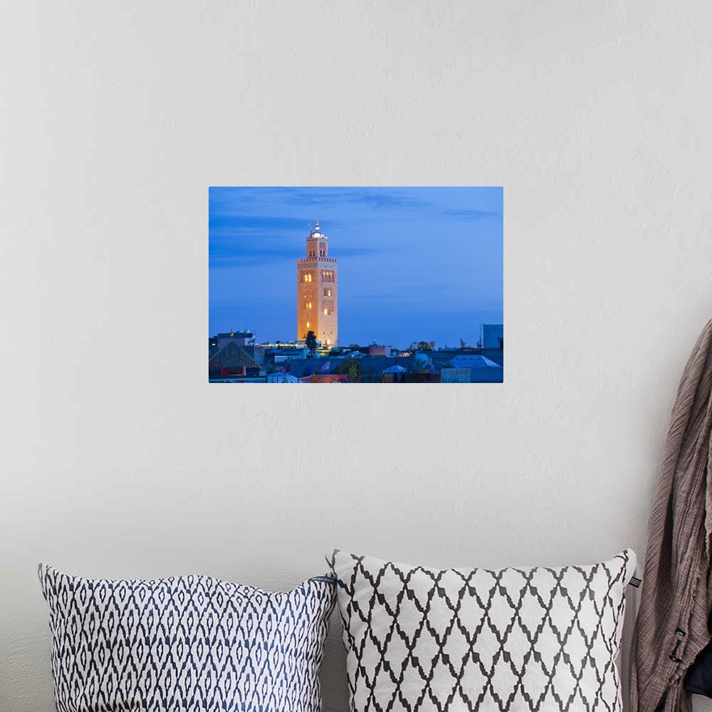 A bohemian room featuring Koutoubia Mosque minaret at night, Marrakech, Morocco, North Africa, Africa