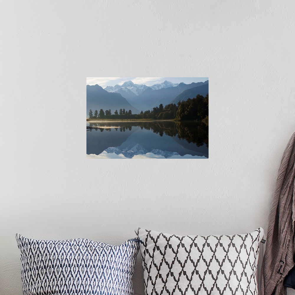 A bohemian room featuring Lake Matheson reflecting Mount Tasman and Aoraki, South Island New Zealand