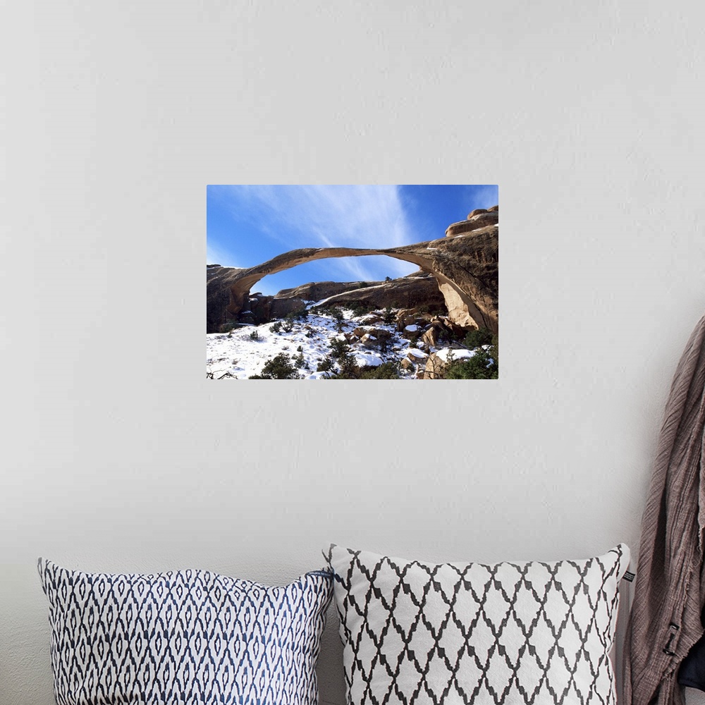 A bohemian room featuring Landscape Arch with snow, Arches National Park, Utah