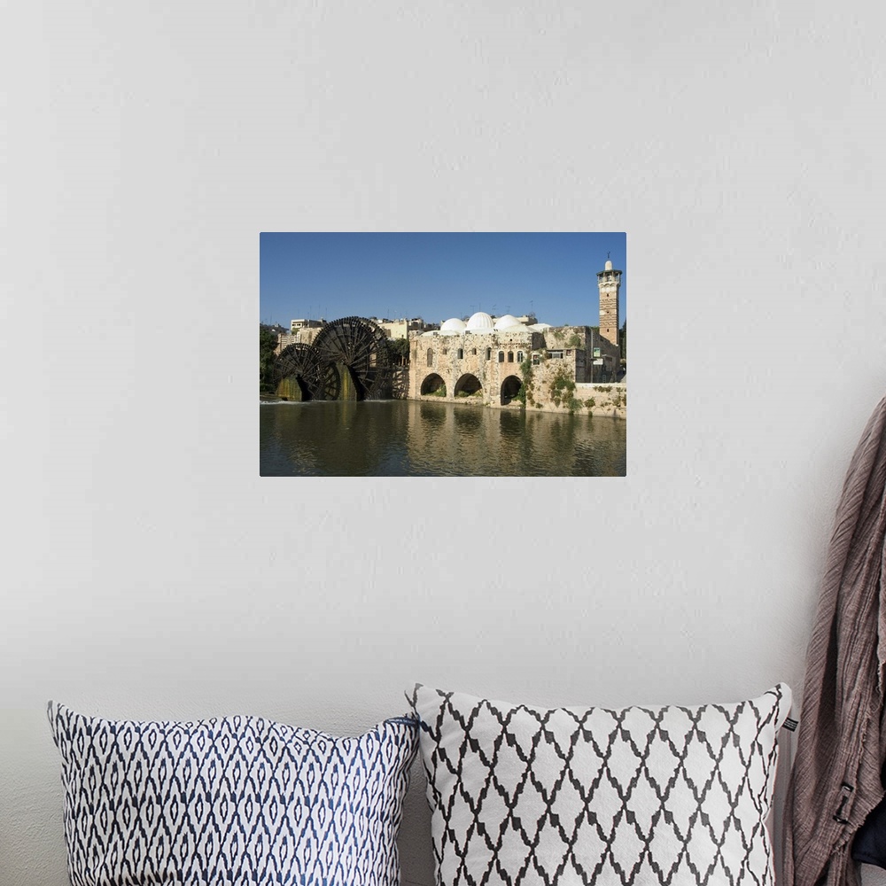 A bohemian room featuring Mosque and water wheels on the Orontes River, Hama, Syria
