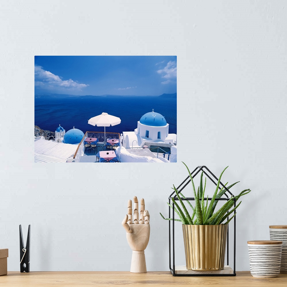 A bohemian room featuring Restaurant by ocean, Oia, Santorini, Cyclades, Greek Islands, Greece, Europe