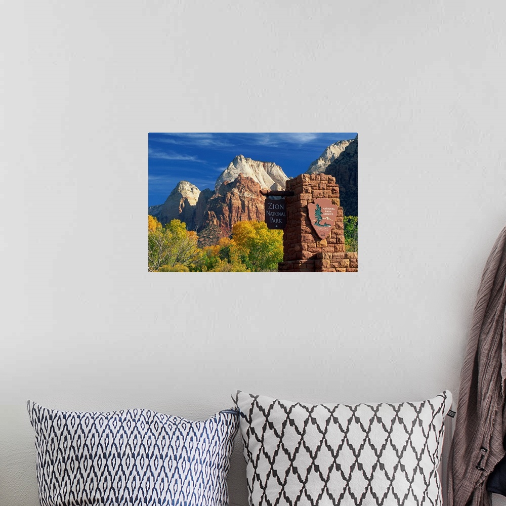 A bohemian room featuring Sign in the Zion National Park, Utah
