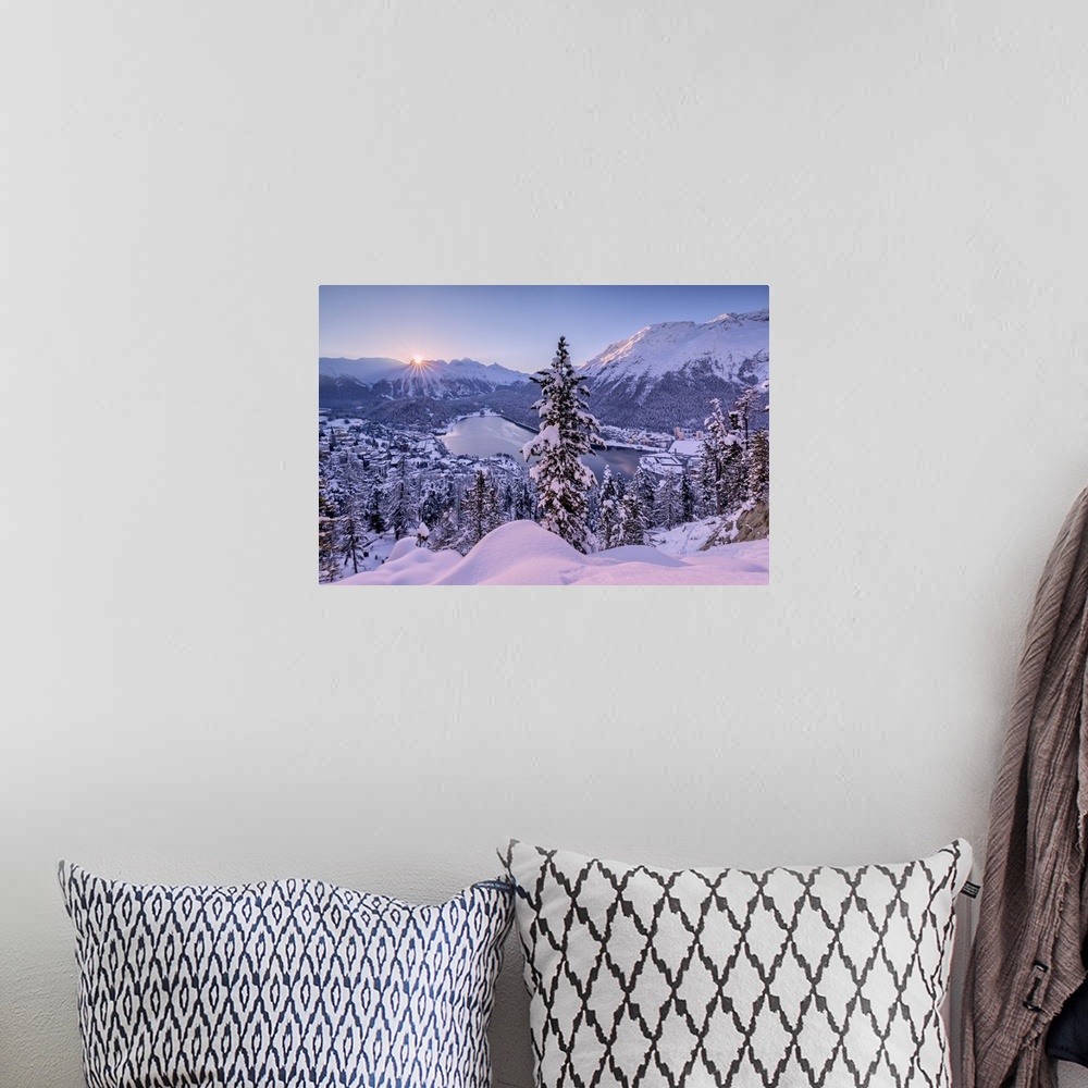 A bohemian room featuring Sunrise over village and Lake of St. Moritz covered with snow, Engadine, Canton of Graubunden, Sw...
