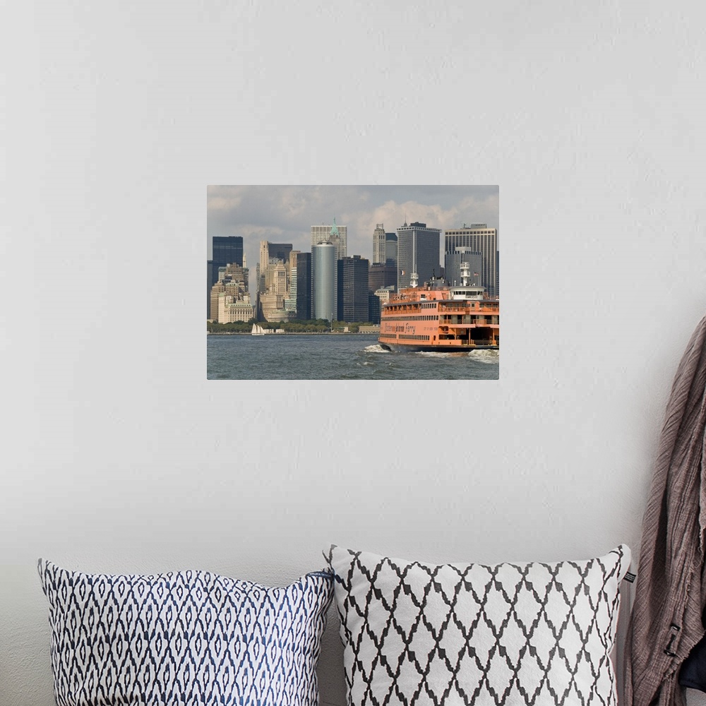 A bohemian room featuring The famous orange Staten Island Ferry approaches lower Manhattan, New York