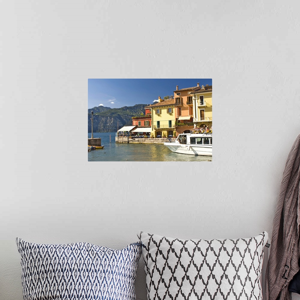 A bohemian room featuring The harbour at Malcesina, Lake Garda, Veneto, Italy