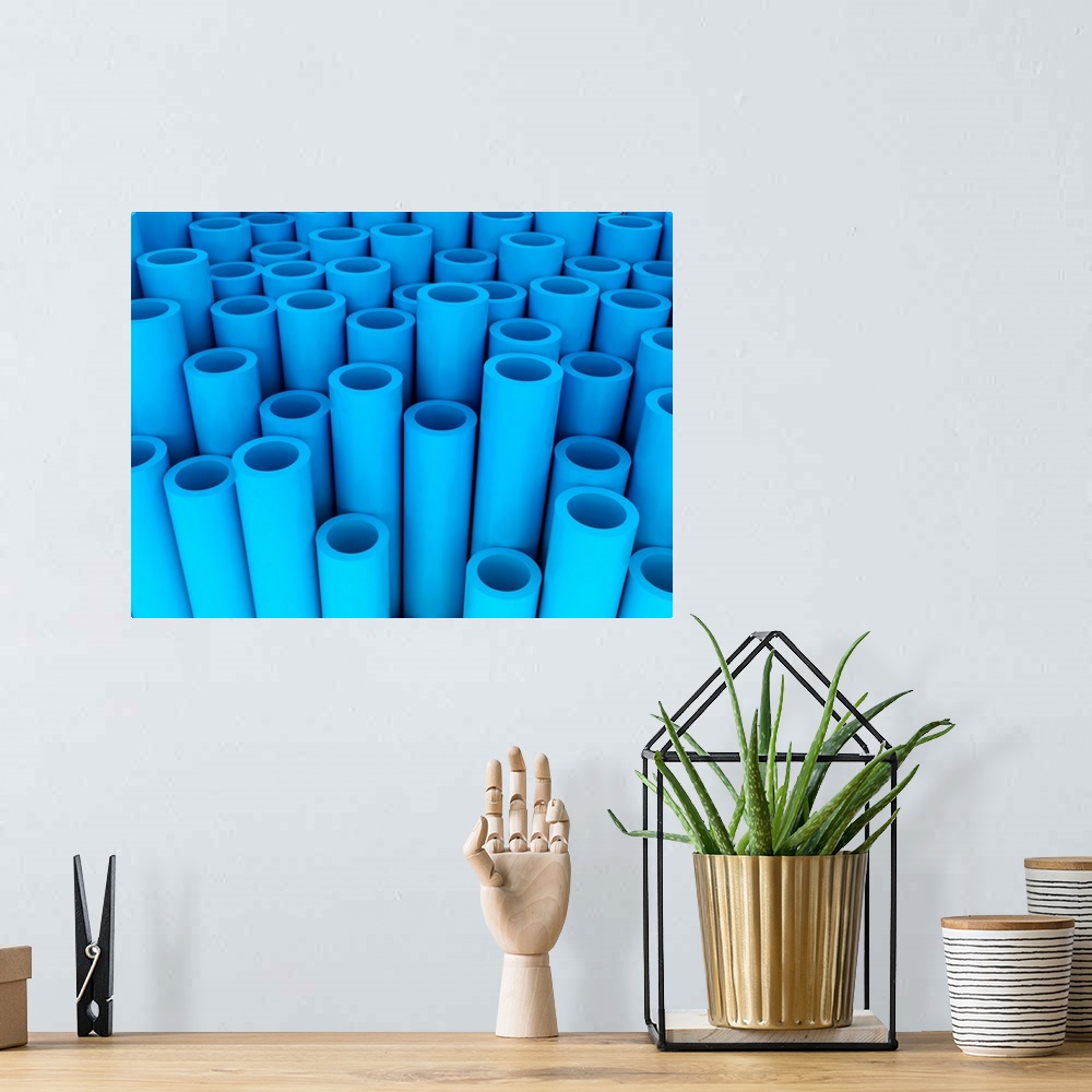 A bohemian room featuring Blue tubes, illustration.