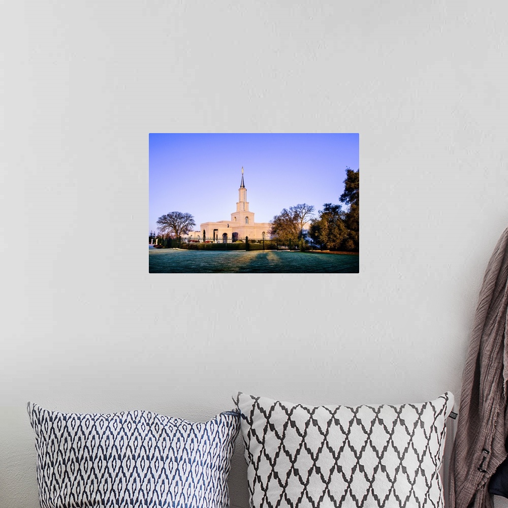 A bohemian room featuring The Sacramento California Temple overlooks Lake Natoma from the hill where it sits. The Sierra Ne...