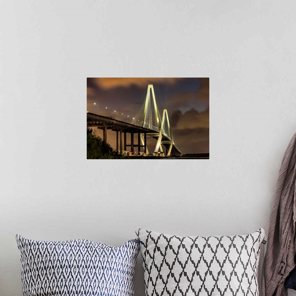 A bohemian room featuring Arthur Ravenel Jr. Bridge crossing the Cooper River at twilight.