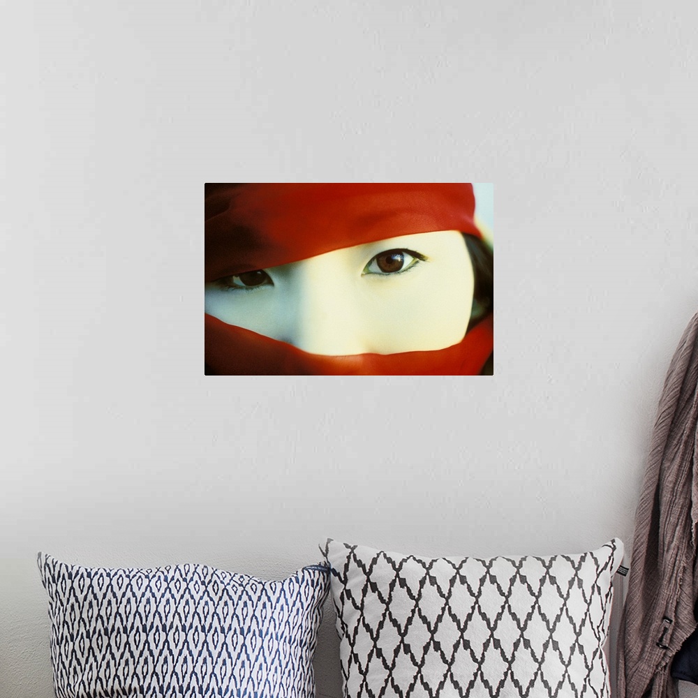 A bohemian room featuring Asian Woman with Red Scarf