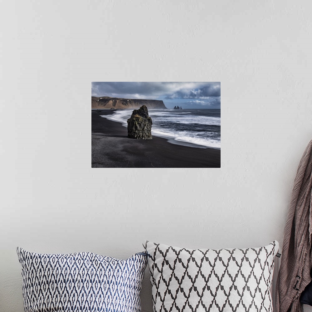 A bohemian room featuring Reynisfjara black sand beach near Vik, Iceland.