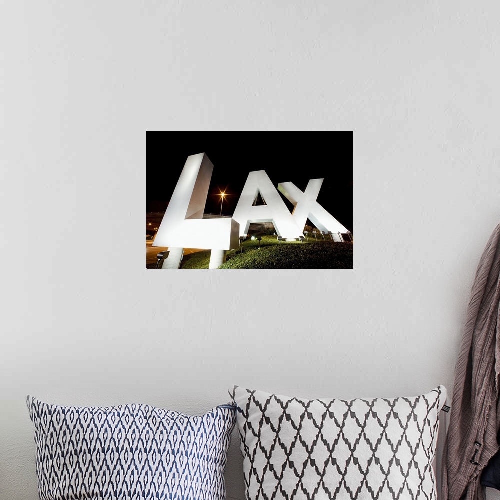 A bohemian room featuring LAX Sign