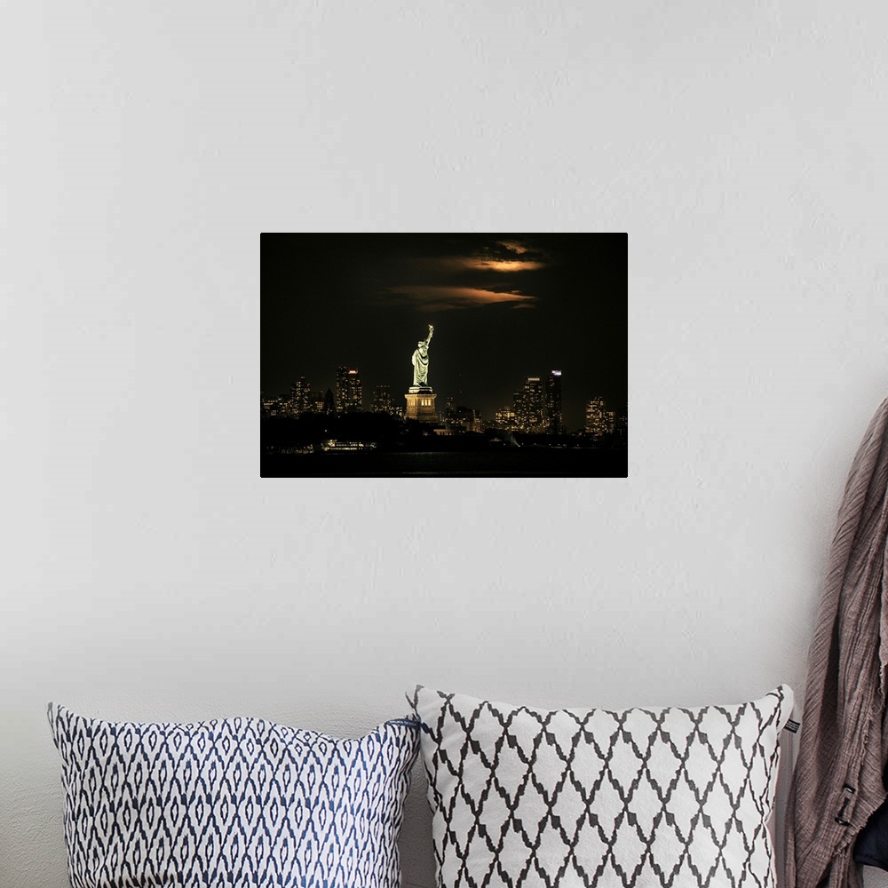 A bohemian room featuring Moonrise over the Stature of Liberty in New York City
