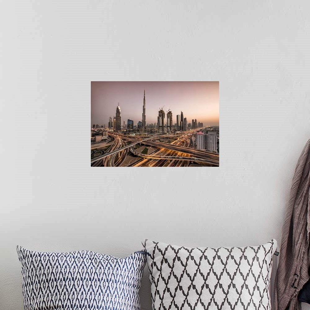 A bohemian room featuring The Burj Khalifa and massive interchange of Dubai.