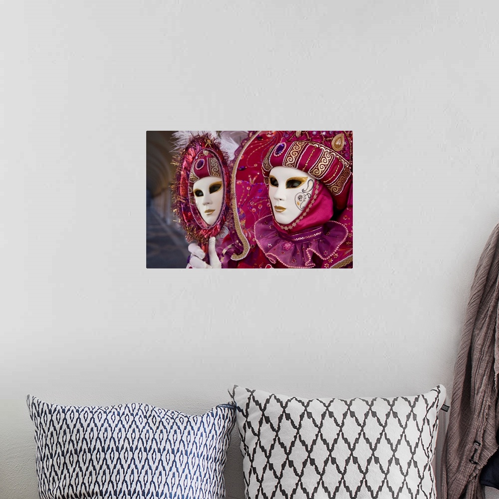A bohemian room featuring Woman in masquerade outfit at Carnival in Venice, Italy