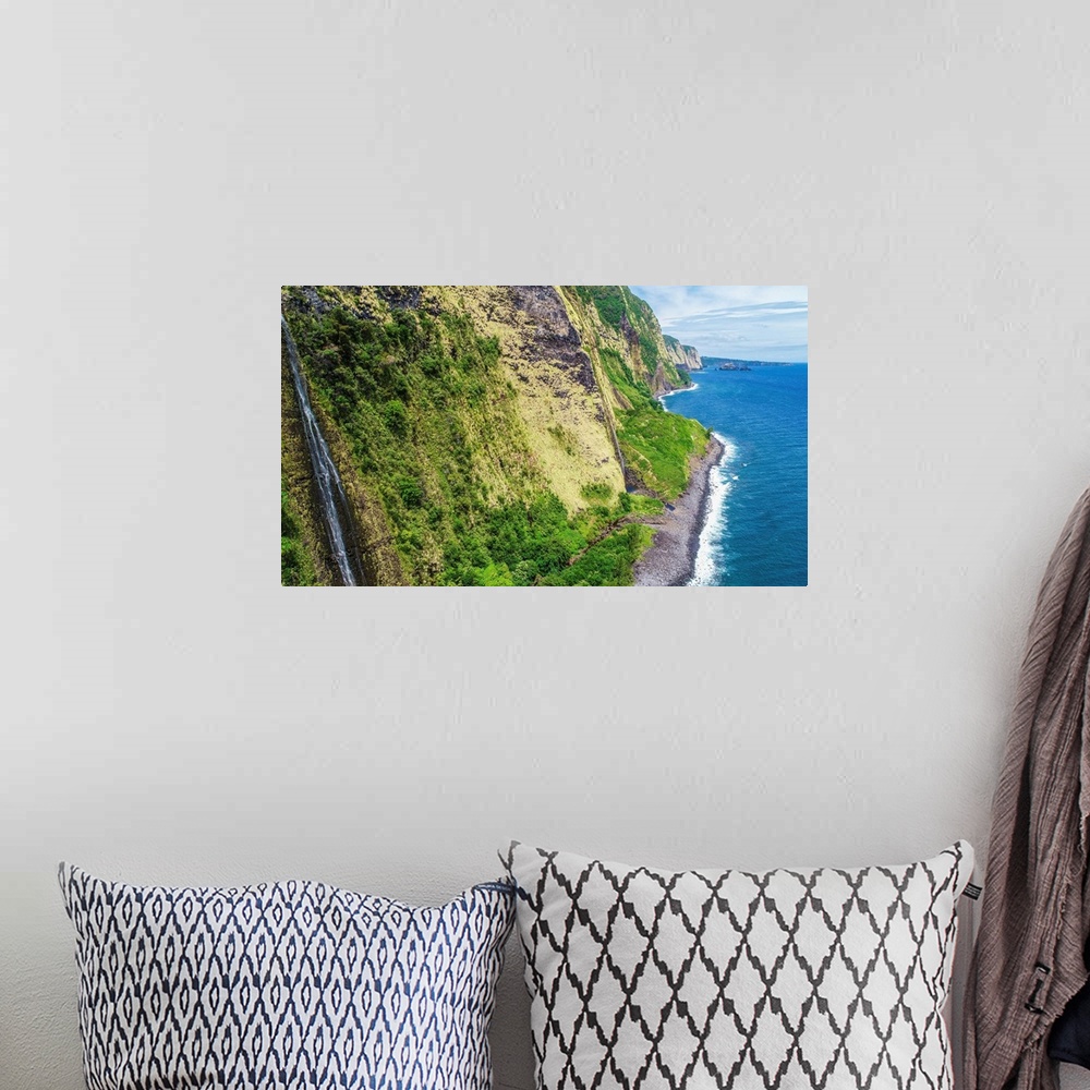 A bohemian room featuring Aerial photograph of a waterfall on the north east shore of Hawaii's big island