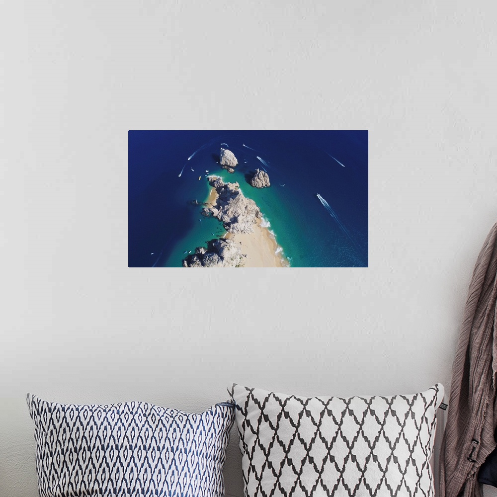 A bohemian room featuring Aerial photograph of the rocks off the tip of the Baja peninsula, Cabo San Lucas, Mexico