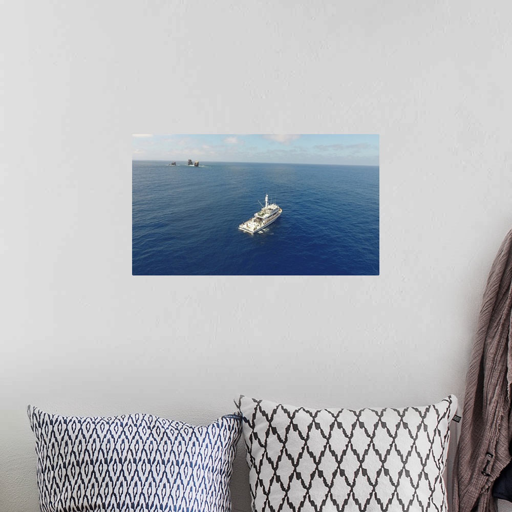 A bohemian room featuring The Excel fishing boat searching for tuna near the Alijos Rocks, Mexico
