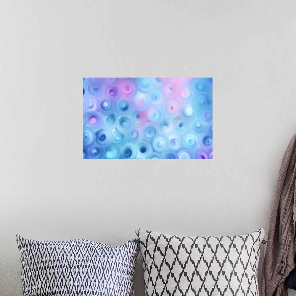 A bohemian room featuring Abstract artwork of overlapping swirling circles in bright shades of blue and pink.