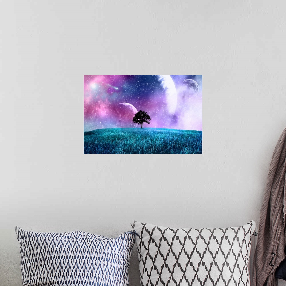 A bohemian room featuring A lone tree in a field under a night sky filled with moons and stars.